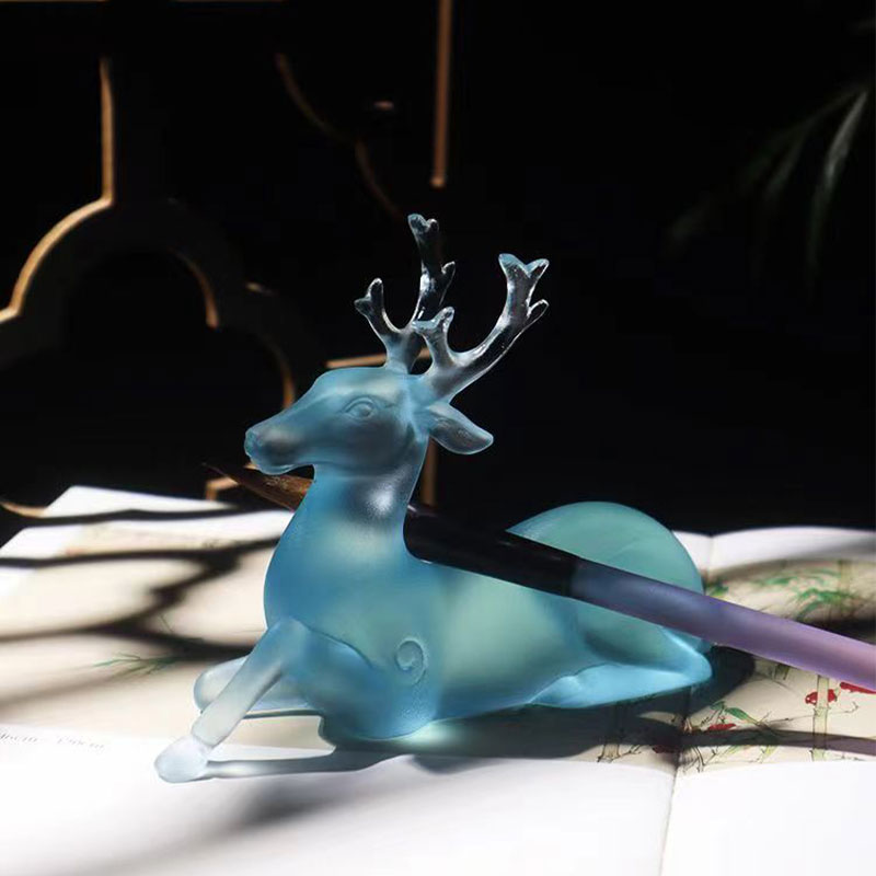 Kék üveg szarvas alakú kefetartó